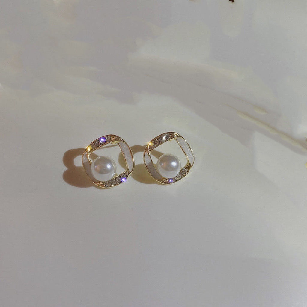 Twisted Hollow Pearl Earrings for Women - Chic Design