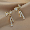 Fashionable Zircon Crystal Bow Earrings with Silver Hooks